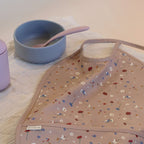 Cena slabbetje met knoeizakje bloem/vogel