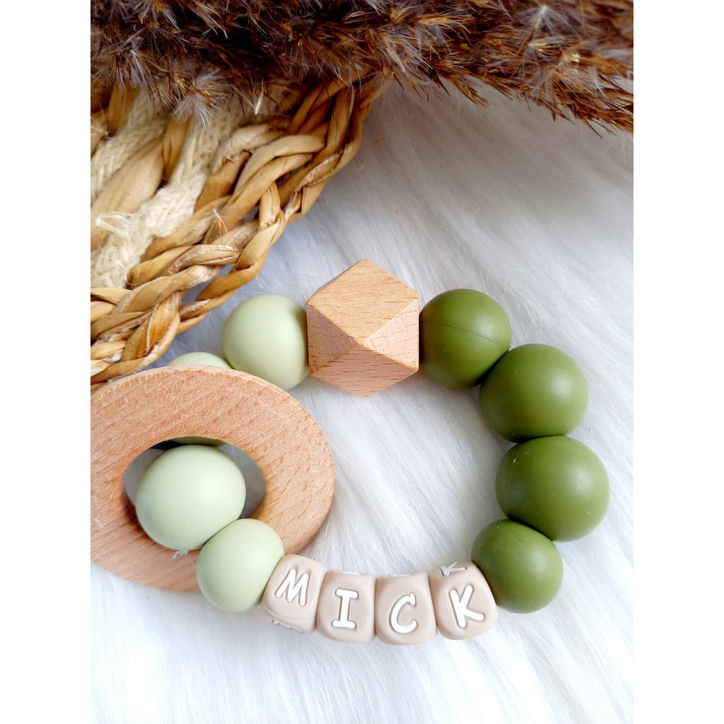 Bijtring met naam Mick