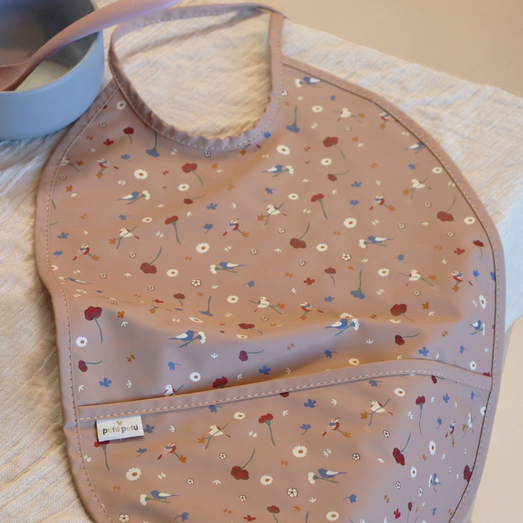 Cena slabbetje met knoeizakje bloem/vogel